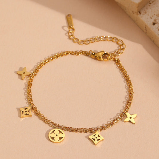Layered Quatrefoil Charm Bracelet