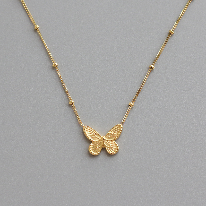 Gold Textured Butterfly Beaded Chain Necklace